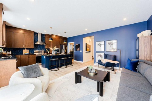 691 Buffaloberry Manor Se, Calgary, AB - Indoor Photo Showing Living Room