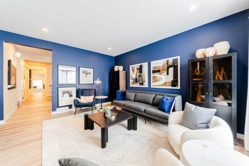 691 Buffaloberry Manor Se, Calgary, AB - Indoor Photo Showing Living Room