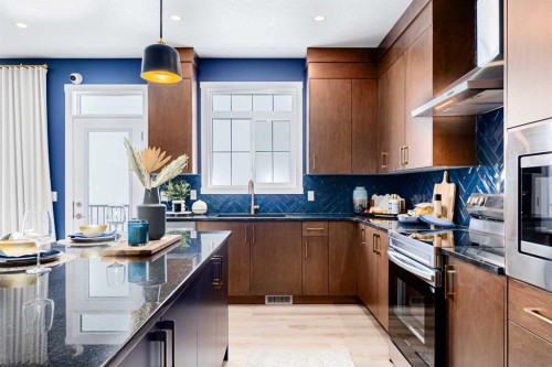 691 Buffaloberry Manor Se, Calgary, AB - Indoor Photo Showing Kitchen