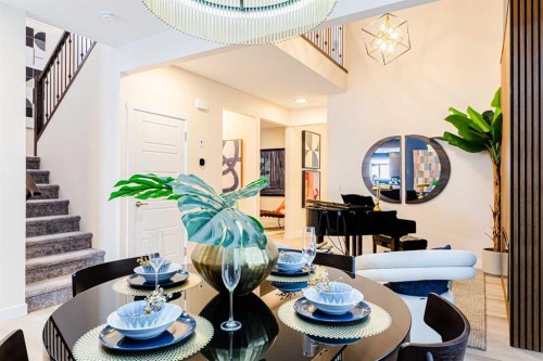 691 Buffaloberry Manor Se, Calgary, AB - Indoor Photo Showing Dining Room