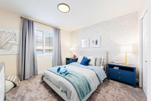 691 Buffaloberry Manor Se, Calgary, AB - Indoor Photo Showing Bedroom