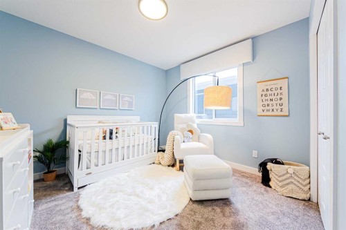 691 Buffaloberry Manor Se, Calgary, AB - Indoor Photo Showing Bedroom