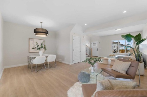 84 Buffaloberry Manor Se, Calgary, AB - Indoor Photo Showing Living Room