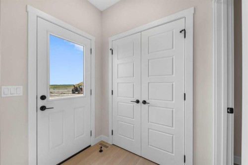 84 Buffaloberry Manor Se, Calgary, AB - Indoor Photo Showing Other Room