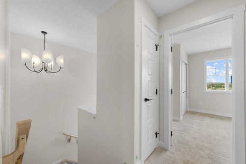 84 Buffaloberry Manor Se, Calgary, AB - Indoor Photo Showing Other Room