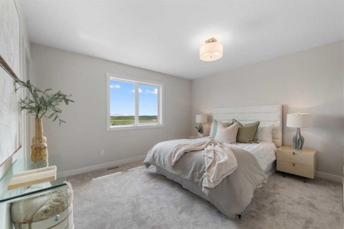 84 Buffaloberry Manor Se, Calgary, AB - Indoor Photo Showing Bedroom