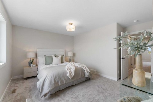 84 Buffaloberry Manor Se, Calgary, AB - Indoor Photo Showing Bedroom
