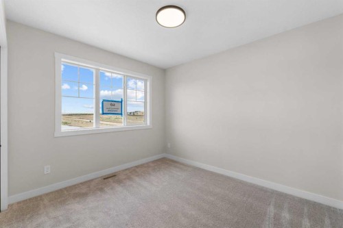 84 Buffaloberry Manor Se, Calgary, AB - Indoor Photo Showing Other Room