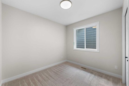 84 Buffaloberry Manor Se, Calgary, AB - Indoor Photo Showing Other Room