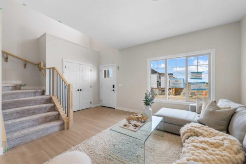 84 Buffaloberry Manor Se, Calgary, AB - Indoor Photo Showing Living Room