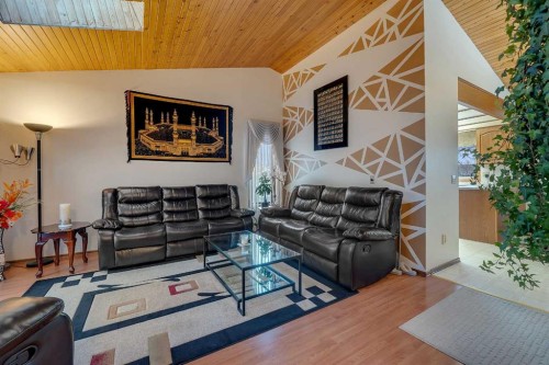 48 Castleglen Court Ne, Calgary, AB - Indoor Photo Showing Living Room