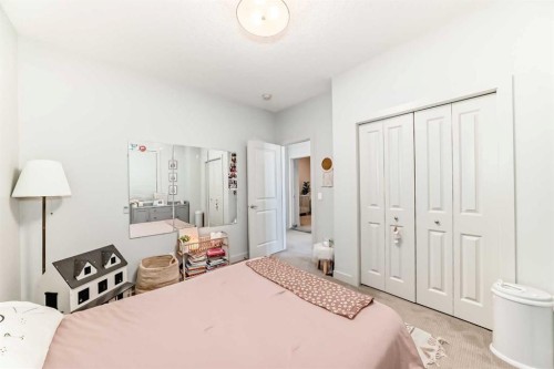 743 Shawnee Drive Sw, Calgary, AB - Indoor Photo Showing Bedroom