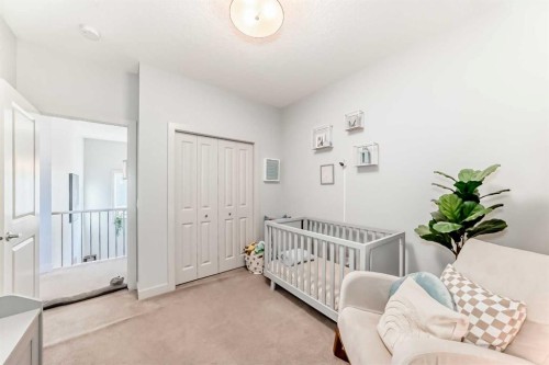 743 Shawnee Drive Sw, Calgary, AB - Indoor Photo Showing Bedroom