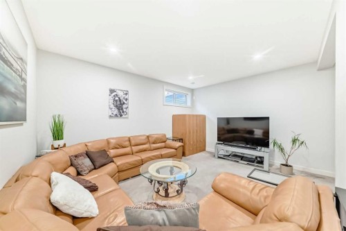 743 Shawnee Drive Sw, Calgary, AB - Indoor Photo Showing Living Room