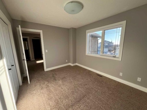 75 Royal Abbey Rise Nw, Calgary, AB - Indoor Photo Showing Other Room