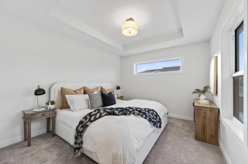 1051 Bayview Crescent, Airdrie, AB - Indoor Photo Showing Bedroom