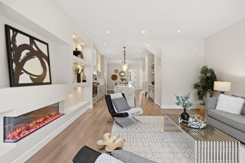 2528 7 Avenue Nw, Calgary, AB - Indoor Photo Showing Living Room With Fireplace