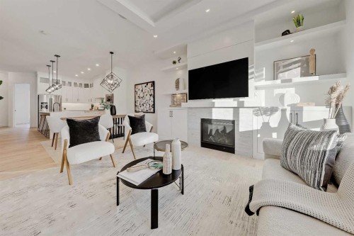 911 22 Avenue Nw, Calgary, AB - Indoor Photo Showing Living Room With Fireplace
