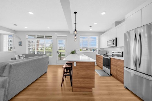 4397 Seton Drive Se, Calgary, AB - Indoor Photo Showing Kitchen With Upgraded Kitchen