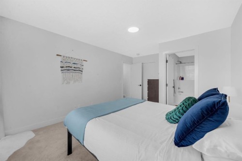 4397 Seton Drive Se, Calgary, AB - Indoor Photo Showing Bedroom