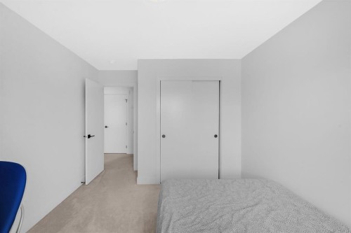 4397 Seton Drive Se, Calgary, AB - Indoor Photo Showing Bedroom