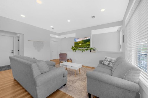 4397 Seton Drive Se, Calgary, AB - Indoor Photo Showing Living Room