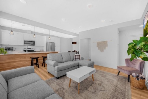 4397 Seton Drive Se, Calgary, AB - Indoor Photo Showing Living Room