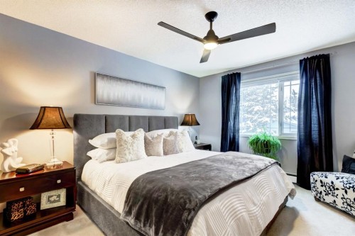 203-2144 Paliswood Road Sw, Calgary, AB - Indoor Photo Showing Bedroom