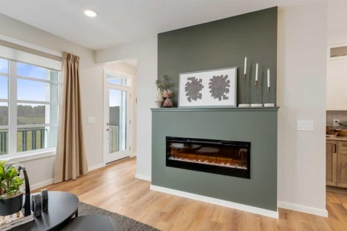 154 Bartlett Crescent Se, Calgary, AB - Indoor Photo Showing Living Room With Fireplace