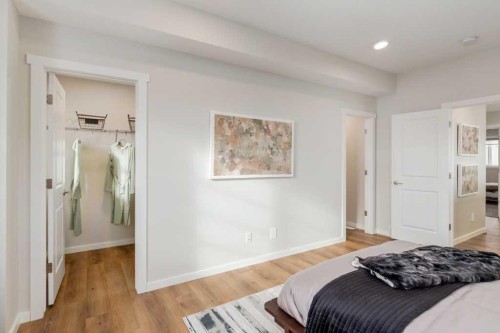 154 Bartlett Crescent Se, Calgary, AB - Indoor Photo Showing Bedroom