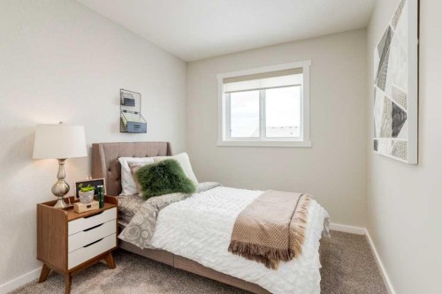 154 Bartlett Crescent Se, Calgary, AB - Indoor Photo Showing Bedroom