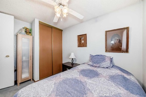 2205 80 Avenue Se, Calgary, AB - Indoor Photo Showing Bedroom