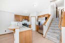 152 Saddlecreek Terrace Ne, Calgary, AB  - Indoor Photo Showing Kitchen With Double Sink 