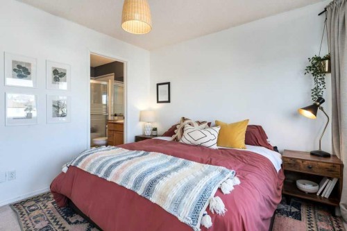 28 Everstone Way Sw, Calgary, AB - Indoor Photo Showing Bedroom