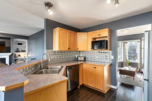 28 Everstone Way Sw, Calgary, AB - Indoor Photo Showing Kitchen With Double Sink