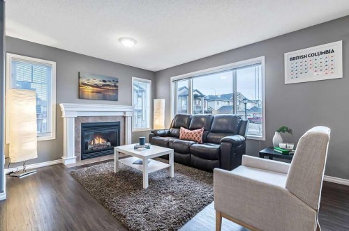 42 Royal Birch Mount Nw, Calgary, AB - Indoor Photo Showing Living Room With Fireplace