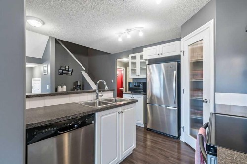 42 Royal Birch Mount Nw, Calgary, AB - Indoor Photo Showing Kitchen With Double Sink