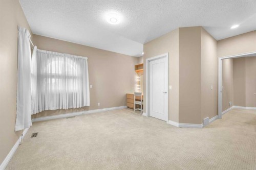 57 Edelweiss Point Nw, Calgary, AB - Indoor Photo Showing Other Room