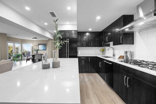 57 Edelweiss Point Nw, Calgary, AB - Indoor Photo Showing Kitchen With Upgraded Kitchen