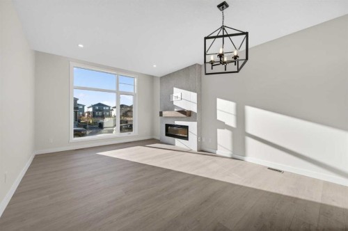 2230 Bayview Drive, Airdrie, AB - Indoor With Fireplace