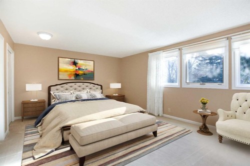 32-275 Woodridge Drive Sw, Calgary, AB - Indoor Photo Showing Bedroom