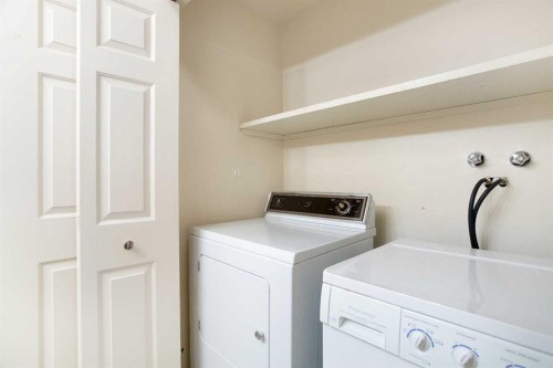 32-275 Woodridge Drive Sw, Calgary, AB - Indoor Photo Showing Laundry Room