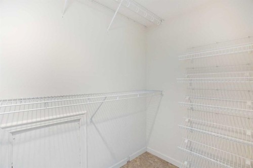 32-275 Woodridge Drive Sw, Calgary, AB - Indoor With Storage