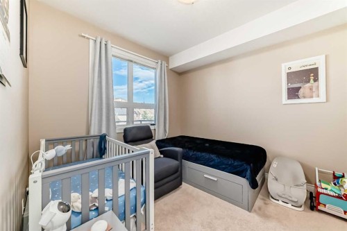 534-26 Val Gardena View Sw, Calgary, AB - Indoor Photo Showing Bedroom