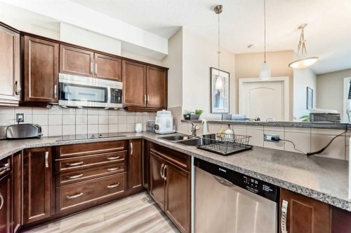 534-26 Val Gardena View Sw, Calgary, AB - Indoor Photo Showing Kitchen With Double Sink