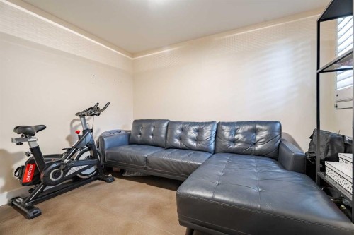 101-3704 15A Street Sw, Calgary, AB - Indoor Photo Showing Gym Room