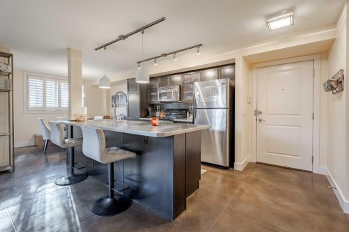 101-3704 15A Street Sw, Calgary, AB - Indoor Photo Showing Kitchen With Stainless Steel Kitchen With Upgraded Kitchen