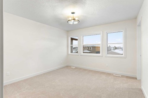 43 Belvedere Point Se, Calgary, AB - Indoor Photo Showing Other Room