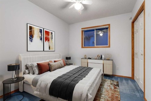 20 Willowbrook Gate Nw, Airdrie, AB - Indoor Photo Showing Bedroom