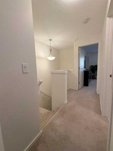 36 Evansborough Common Nw, Calgary, AB - Indoor Photo Showing Other Room